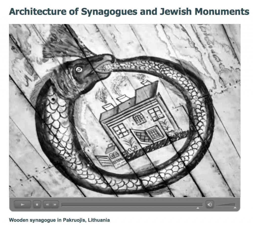 Screen grab from the Center for Jewish Art film on Pakruojis synagogue, showing pre-WW2 ceiling painting of the Leviathan surrounding a town building