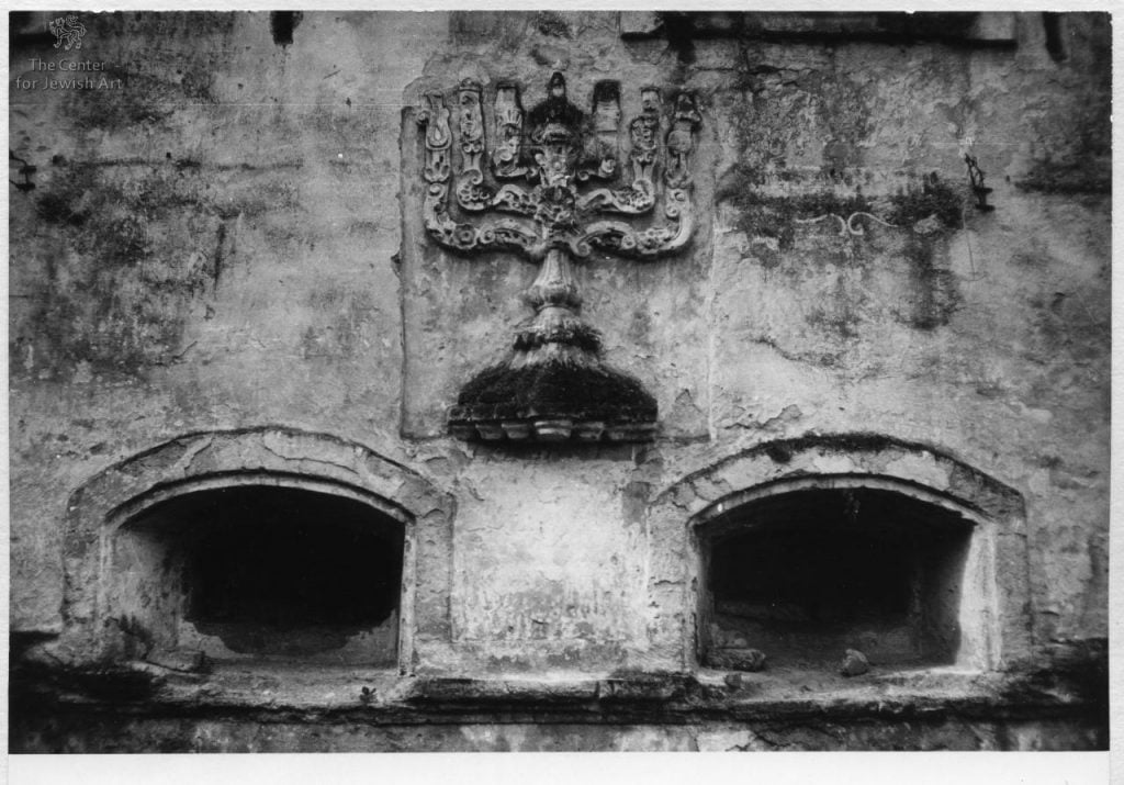 Carved relief of menorah in the Rascov synagogue. It was torn out of the wall by a "collector." Photo: Center for Jewish Art